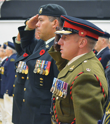 Today's soldiers honouring those of the past as Major Sadler from BATUS and Major Atwell with the Canadian Forces stationed at CFB Suffield stand side-to side, as Canadian and British soldiers have done on so many battlefields over the past 100 years.
