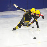 Medicine Hat’s Laura Ebel (rear) gets overtaken blocked out of her lane in a slick move by Jory Brook during the Speed Skating event at the Family Leisure Centre on Feb.14.