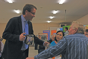 PHOTO BY JAMIE RIEGER- Drew Barnes, MLA for Cypress-Medicine Hat serves coffee following dinner at the Bow Island event on Saturday evening.