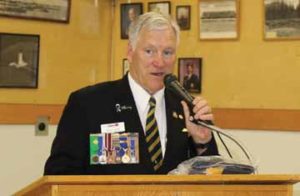 PHOTO BY JAMIE RIEGER- Royal Canadian Legion district commander, Wayne Shaw, commends the local Legion for a job well done in operating a successful Branch in a small community.