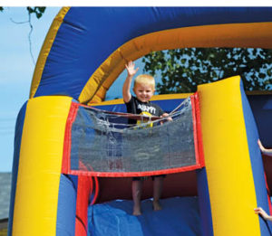 Photo by Tim Kalinowski- There was something for everyone at Redcliff Days. Four-year-old Axel Plante was having a great time at the Legion Memorial Park Fun Fair on Saturday.