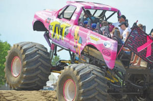 Photo by Tim Kalinowski- Nothing says family like sharing a Monster Truck ride. 