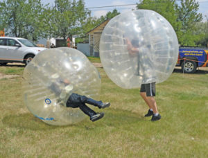 Photo by Jamie Rieger- These big bubbles were just some of the fun for the young people. 