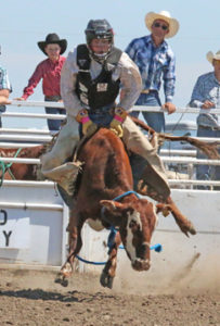 Photo by Jamie Rieger- Irvine's Kole Dolgopol scored 66 points in the steer riding event. 