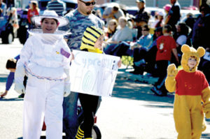 Photo by Tim Kalinowski- This year's 20 Mile Post Days in Irvine had great weather and plenty of community spirit. Pictured: Something sweet is going on at Cypress Hills Honey for the parade.