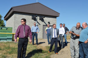 Photo by Tim Kalinowski- Redcliff Public Services director, Jamie Garland (left) gives a tour of the town's new flood-proofed river pump system that was installed as part of the $20-million water treatment plant project. 