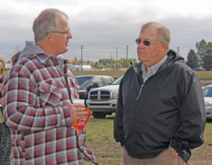 Photo by Jamie Rieger- Gary Babe and David Wikkerink have a chitchat during a break in the festivities.