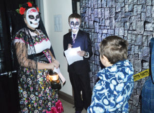 Photo by Tim Kalinowski- Parkside French students welcome Margaret Wooding students to the Day of the Dead.